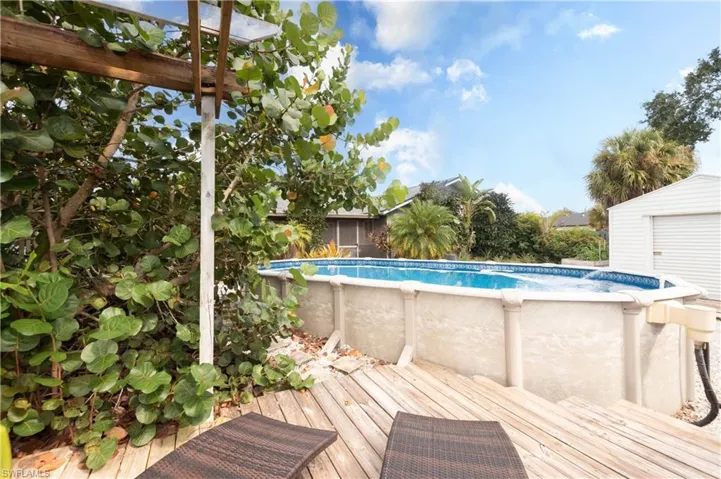 Swimming pool featuring a wooden deck
