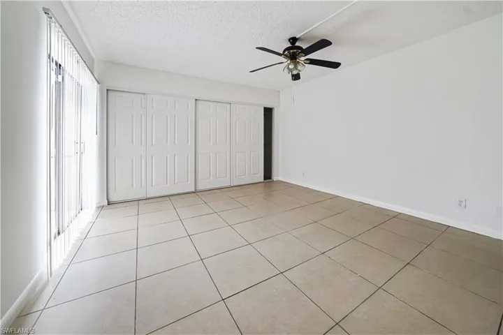 Neutral-toned tile flooring throughout