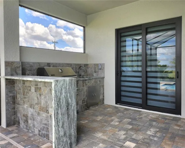 View of patio / terrace with sink and exterior kitchen