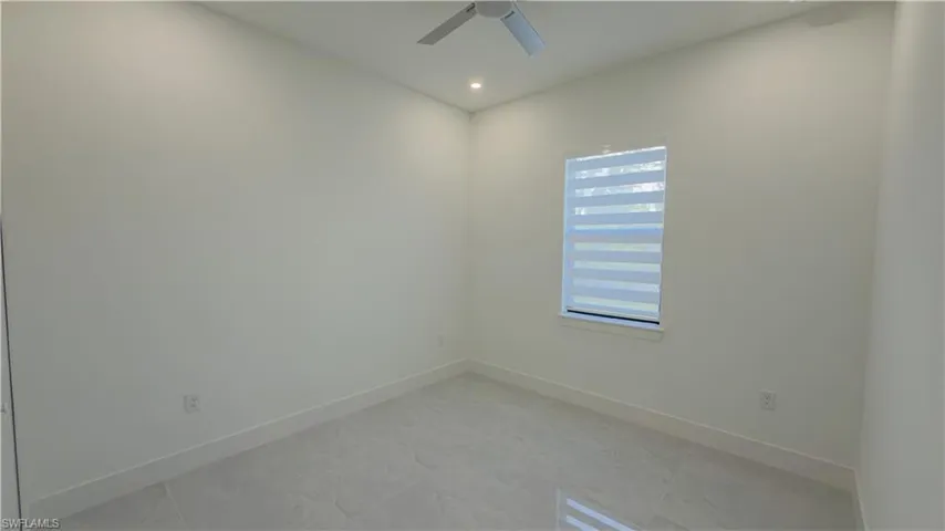 Spare room featuring recessed lighting and ceiling fan