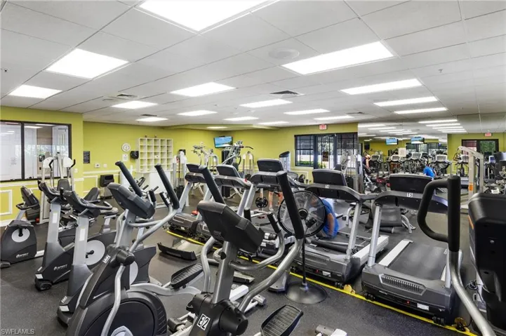 Workout area featuring a paneled ceiling