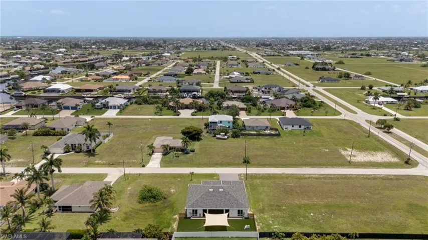 Aerial perspective showcasing a residential area with varied housing styles