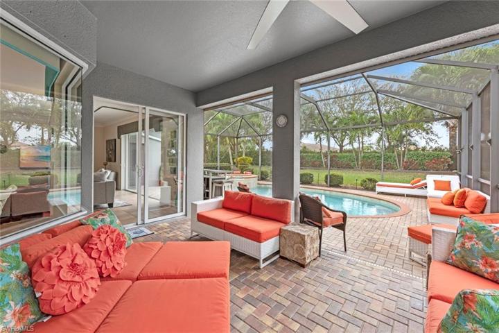 Covered lanai looking out to pool