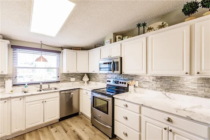 10104  Pine Lakes  BLVD, North Fort Myers, FL 33903