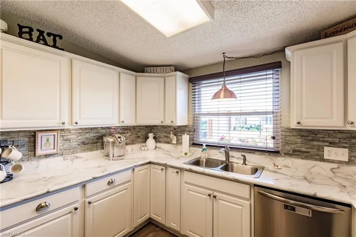 10104  Pine Lakes  BLVD, North Fort Myers, FL 33903