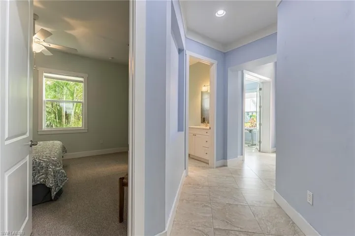 Corridor leading to front door.