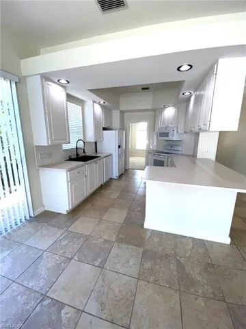 7617  Garibaldi  CT, Naples, FL 34114
