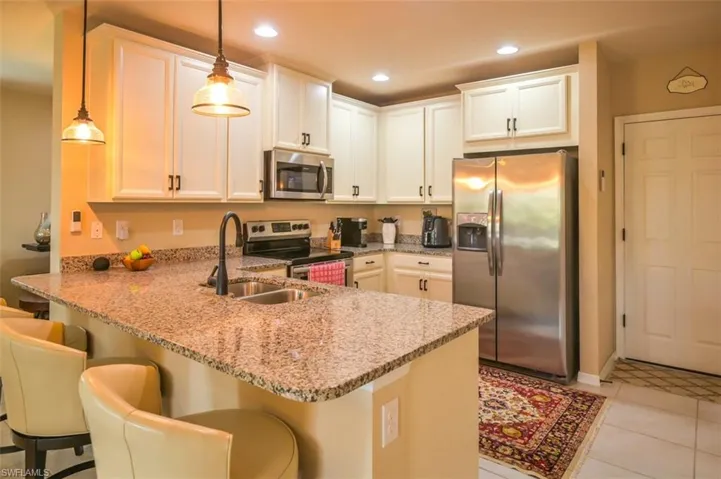 Granite countertops and wood cabinets
