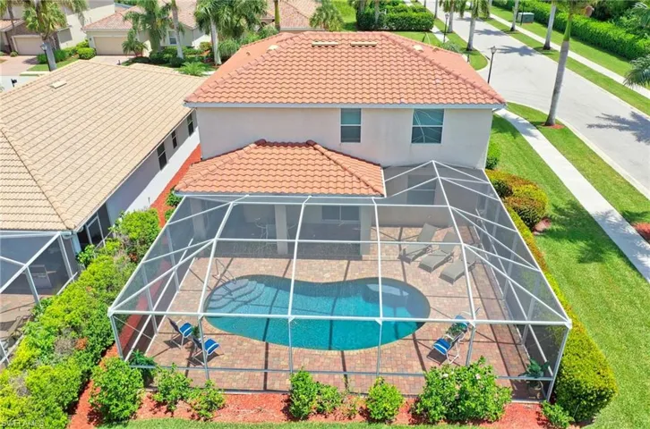 View from above of property featuring a pool