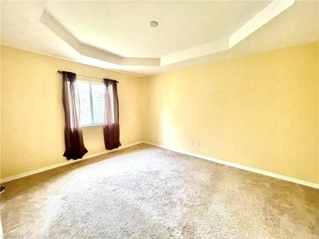 Primary Bedroom with two closets and a private bathroom