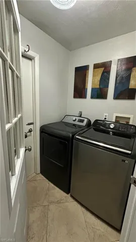 Laundry area with separate washer and dryer