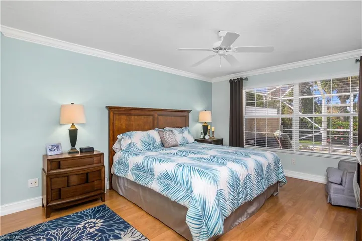 Primary Bedroom with windows to the lanai