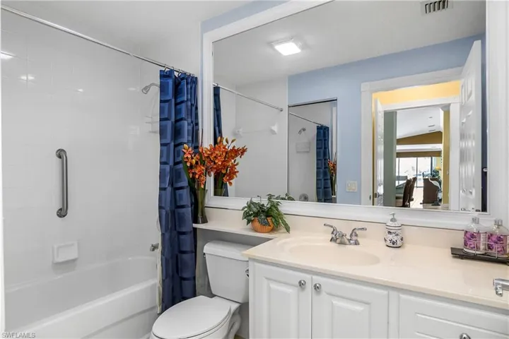 Guest Bath with  Framed Mirror Shower and Tub