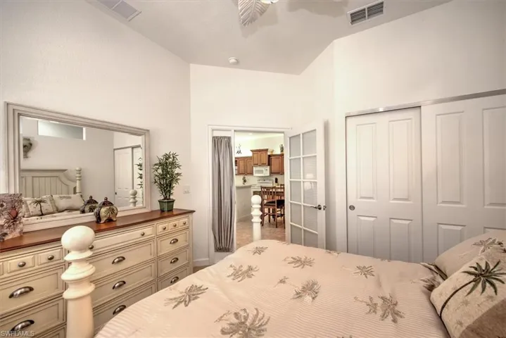 Bedroom featuring carpet, a closet, and ceiling fan