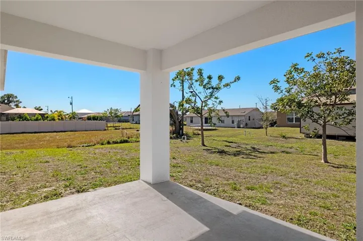 View of yard featuring a patio area and a residential view