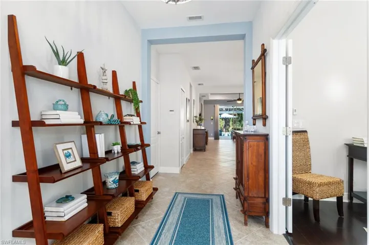 Foyer with attached shelving