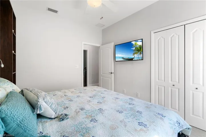 Custom closet and TV stays with the house