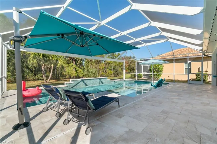 Large Umbrella fixed to the pool deck