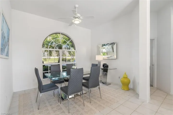 Dining room with beautiful arched window