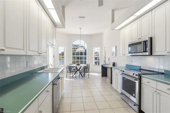 With breakfast area, western exposure to the pool & lake