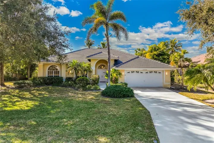 Front elevation, double garage, concrete driveway