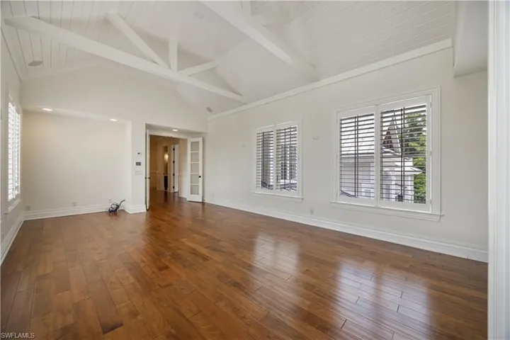 Spacious Family Room with Hardwood Flooring
