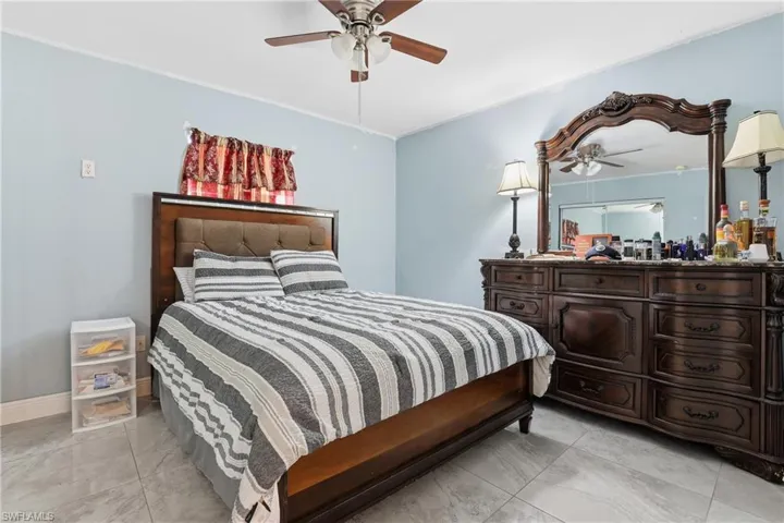 Bedroom featuring a ceiling fan