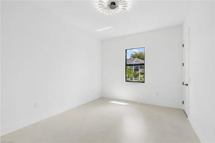 Neutral tone walls and light-colored tile flooring