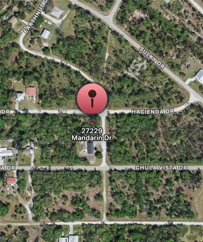 Aerial overview of property's location with property parcel outlined