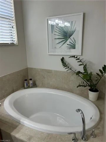 Full bath with a bath