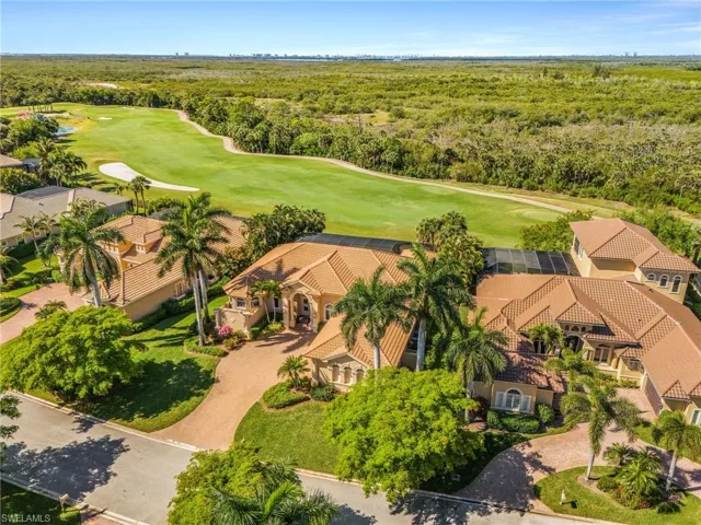Aerial view of residential area with a golf course