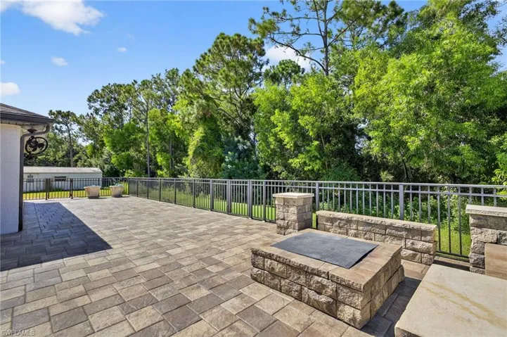 View of patio / terrace featuring view of scattered trees