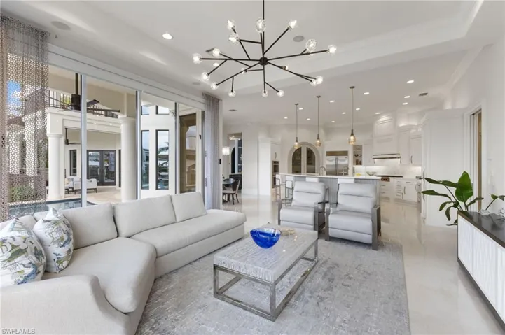 Living room with view into the kitchen