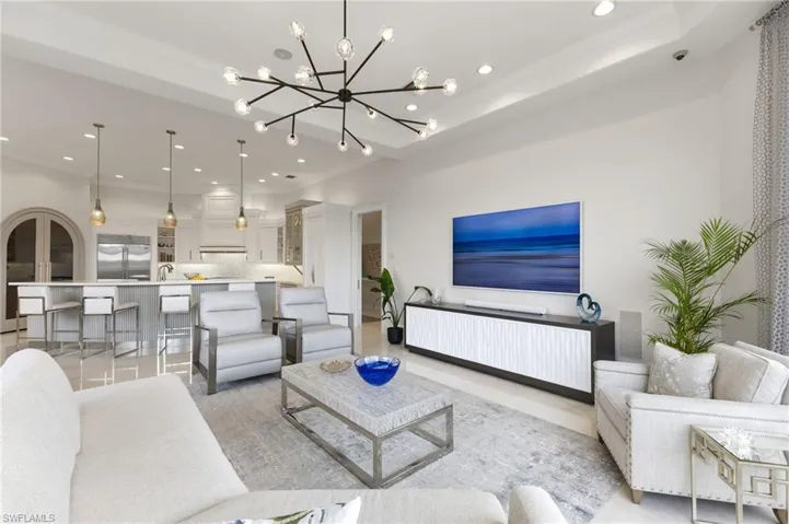 Living room with view into the kitchen