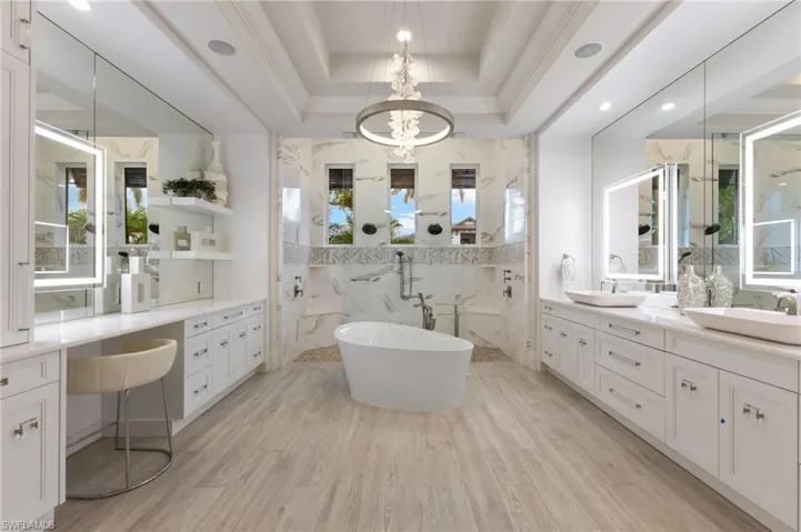 Primary bathroom with dual vanities