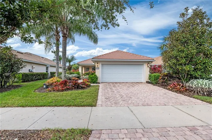 28528 Hammerhead Ln Bonita Springs 34135 - Street view with left side easement