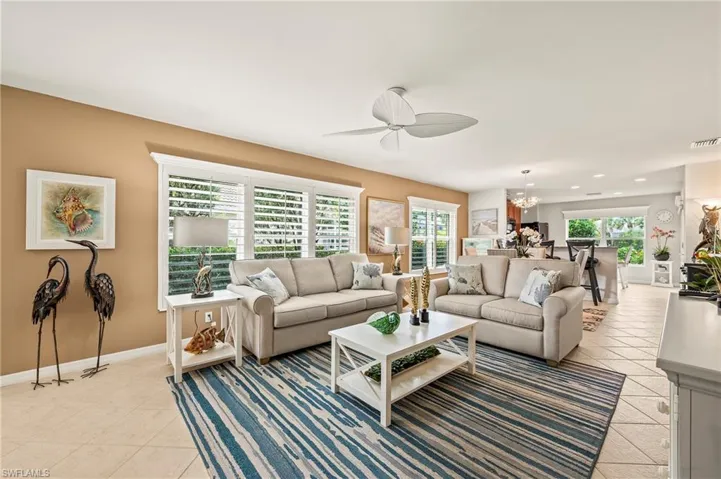 28528 Hammerhead Ln Bonita Springs 34135 - Wall of windows with southern exposure keep this home bright all day