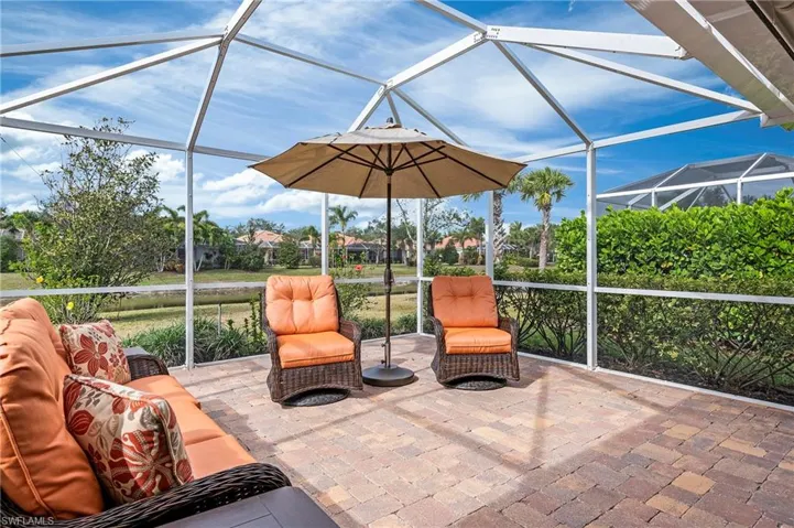 28528 Hammerhead Ln Bonita Springs 34135 - Screened patio overlooks the lake