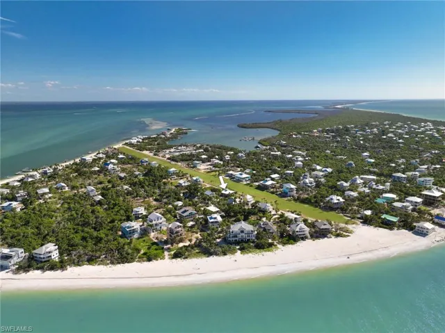 Bird's eye view with a beach view and a water view