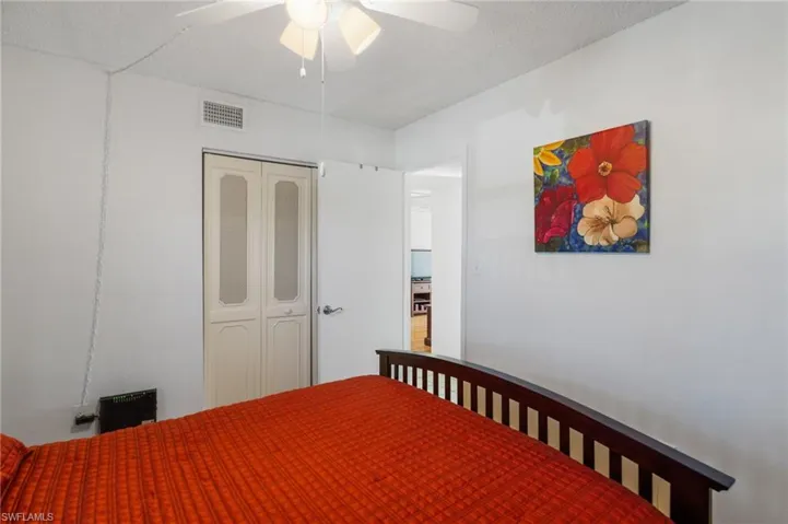 Bedroom with a closet, and ceiling fan