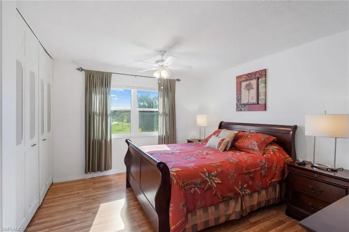 Master Bedroom featuring ceiling fan, light wood-type flooring and a closet