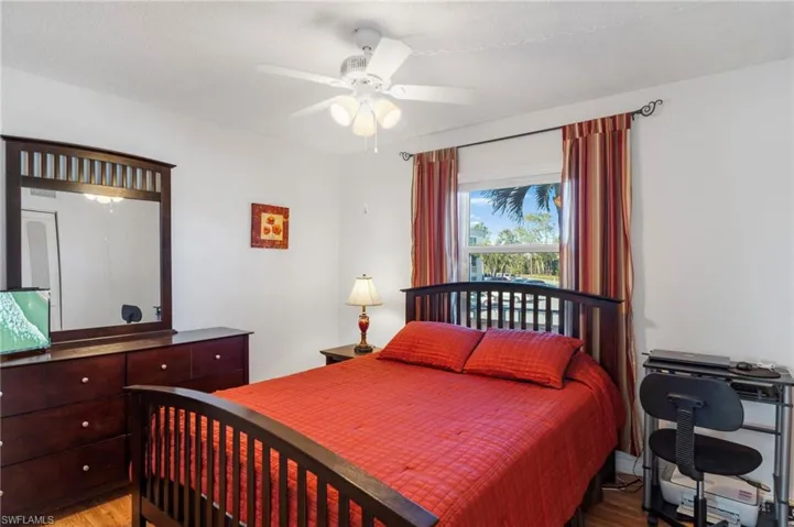 Bedroom featuring  light hardwood / wood-style flooring, and ceiling fan