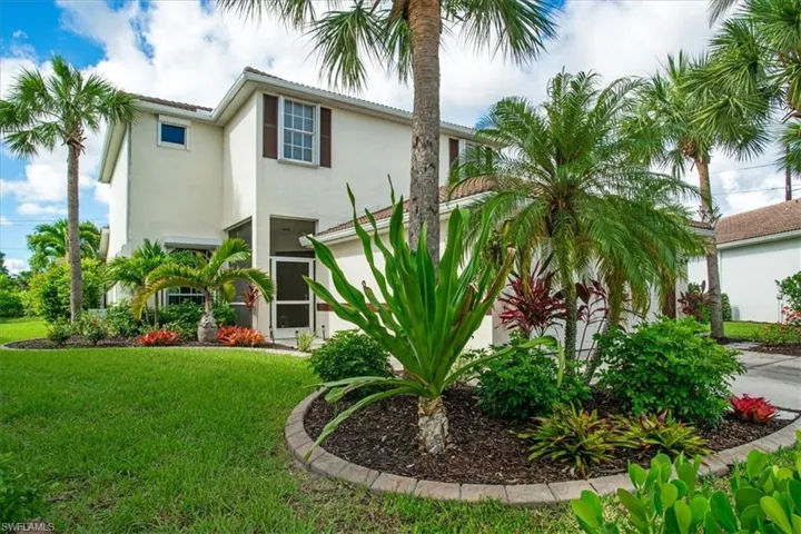 View of front of house with a front yard