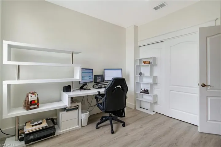 Office area featuring light wood-type flooring