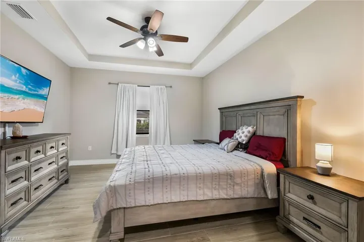 LARGE PRIMARY BEDROOM WITH TRAY CEILING