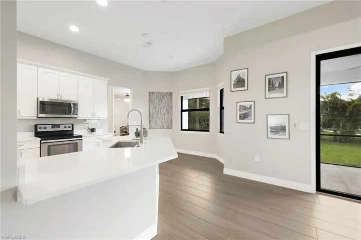 EAT-IN KITCHEN WITH QUARTZ COUNTERTOPS