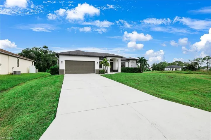 FRONT ELEVATION WITH 4-CAR DRIVEWAY