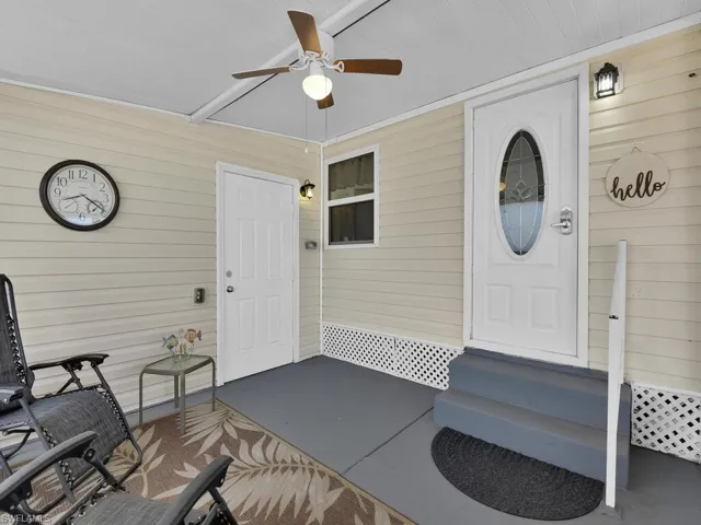 screened front entry with storage shed
