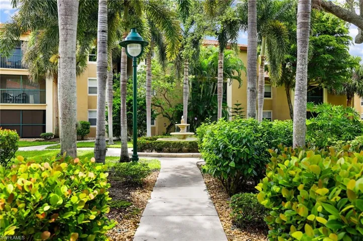 Tropical Paradise with Water Fountain, Lighted, Landscaped Paths throughout!