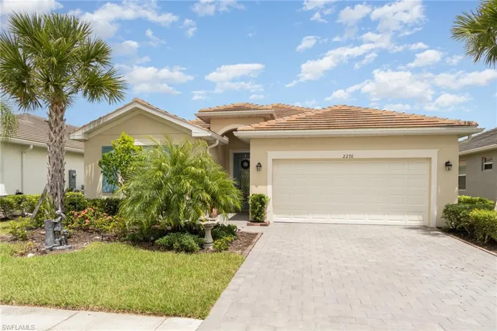 View of front of property with a garage